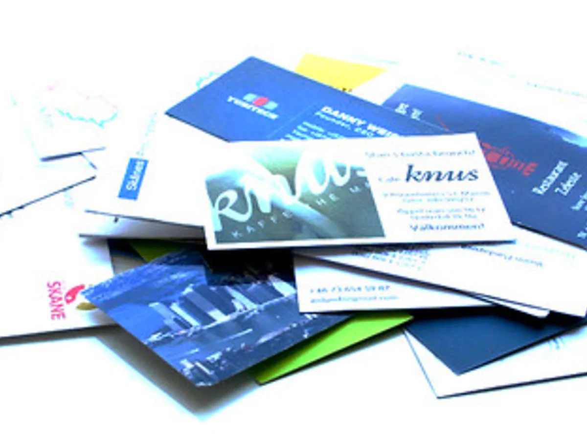 Freshly printed business cards stacked