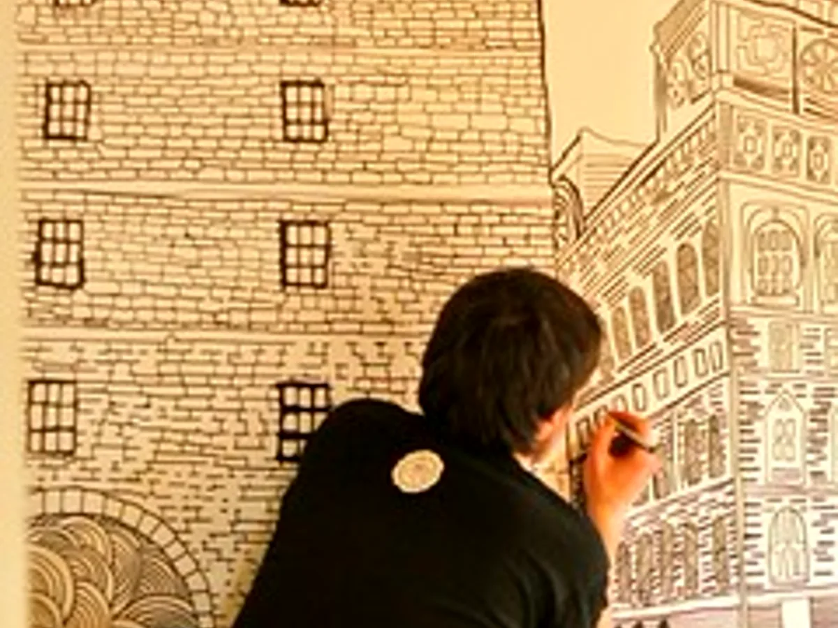 Designer working on artwork by hand
